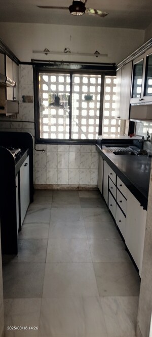 Kitchen in 3 BHK Apartment at Panchavati Gardens, Malad East – for Sale