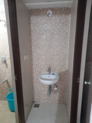 Bathroom in 1 BHK Apartment at Lodha Palava City Lakeshore Greens, Dombivli East – for Rent