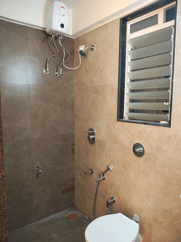 Bathroom in 2 BHK Apartment at Mahavir Kalpavruksha, Ghodbunder Road – for Rent