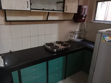 Kitchen in 1 BHK Apartment at Windsor Estate, Kalyani Nagar – for Rent