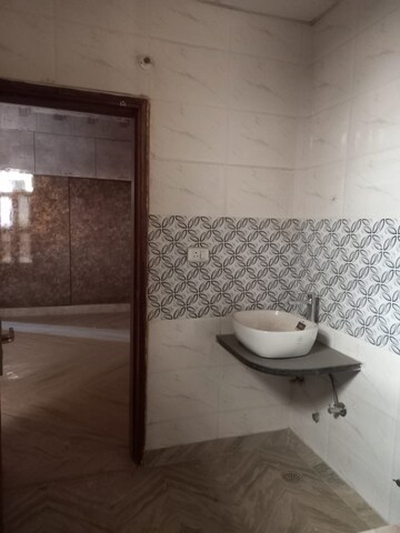 Bathroom in 4 BHK Builder Floor at Shakti Khand iv – for Rent