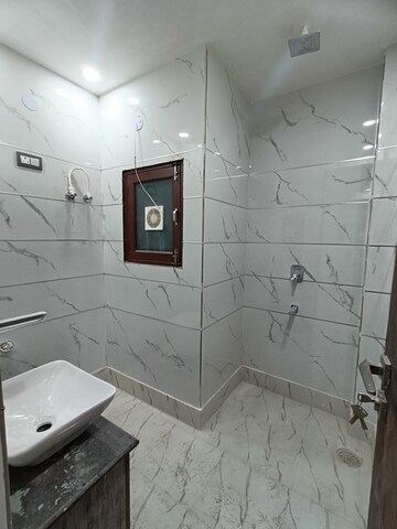 Bathroom in 3 BHK Builder Floor at Dwarka Mor – for Sale