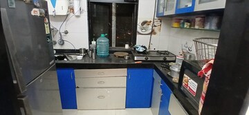 Kitchen in 1.5 BHK Apartment at Vashi Sector 19 – for Sale