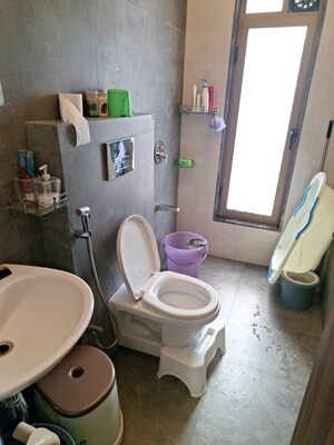Bathroom in 2 BHK Apartment at Tejukaya Signare, Matunga East – for Sale