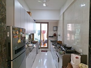 Kitchen in 2 BHK Apartment at Tejukaya Signare, Matunga East – for Sale