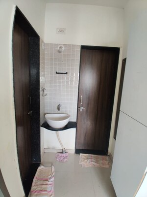 Bathroom in 1 BHK Apartment at Vijayalaxmi Laxmisatyam Residency, Dhanori – for Sale