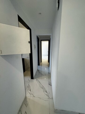 Building Lobby in 2 BHK Apartment at Dev Leo Tower, Oshiwara – for Rent