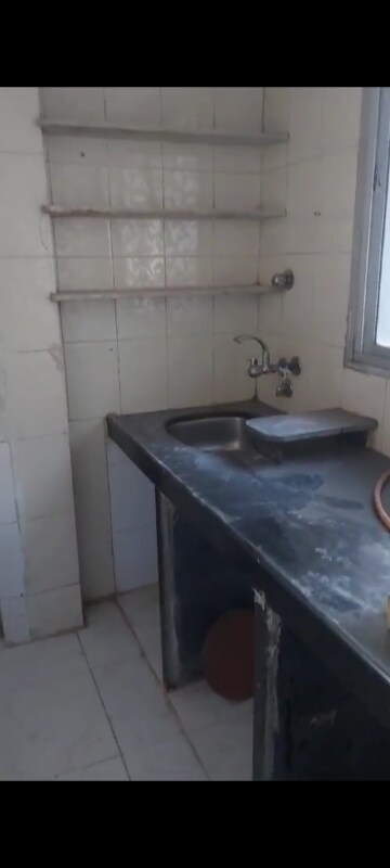 Kitchen in 1 RK Apartment at Hakimi CHS, Goregaon West – for Rent