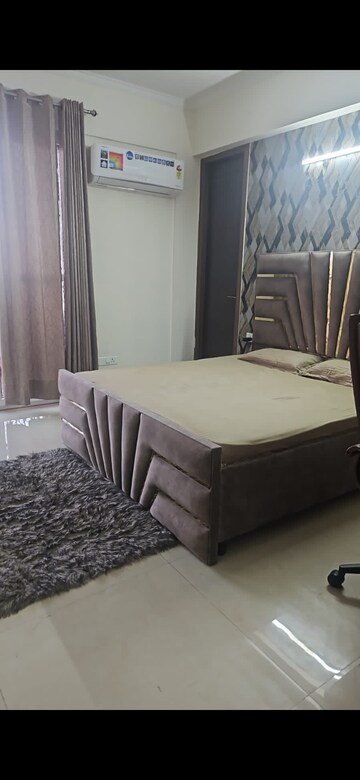 Bedroom in 3 BHK Apartment at Affinity Greens, International Airport Road – for Rent