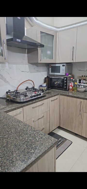 Kitchen in 3 BHK Apartment at Affinity Greens, International Airport Road – for Rent