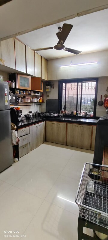 Kitchen in 2 BHK Apartment at Ratna Samuha CHS, Andheri West – for Rent