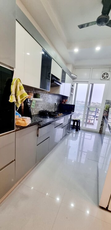 Kitchen in 3 BHK Builder Floor at Ansal API Esencia, Sector 67 – for Rent