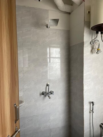 Bathroom in 1 RK Apartment at Emaar Emerald Floors Premier, Sector 65 – for Rent