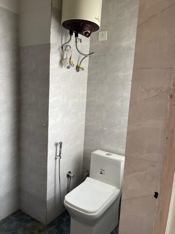 Bathroom in 1 RK Apartment at Emaar Emerald Floors Premier, Sector 65 – for Rent