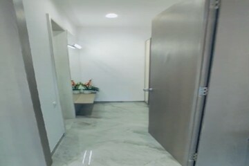 Bathroom in 4 BHK Apartment at Kohinoor Woodshire, Bhugaon – for Sale