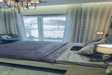 Bedroom in 4 BHK Apartment at Kohinoor Woodshire, Bhugaon – for Sale