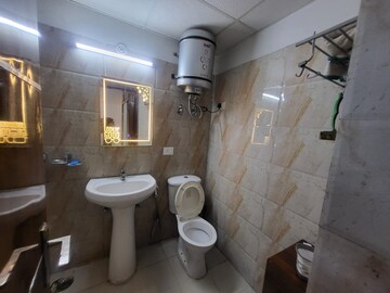 Bathroom in 3 BHK Apartment at Sector 16b Greater Noida – for Rent