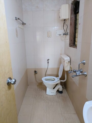 Bathroom in 2 BHK Apartment at Raj Paradise B Wing CHS Ltd, Andheri East – for Rent
