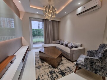 Living Room in 3 BHK Apartment at Motia Blue Ridge, Dhakoli Village – for Sale