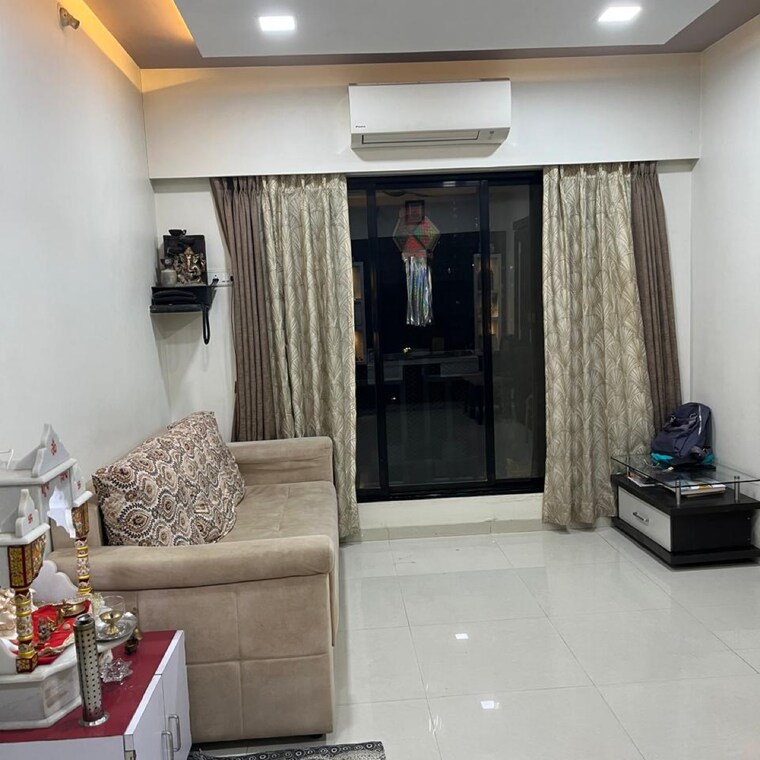 Living Room, raunak-unnathi-woods-phase-6 2 Bedroom 516 Sq.Ft. Apartment In Kasarvadavali Thane 8389865