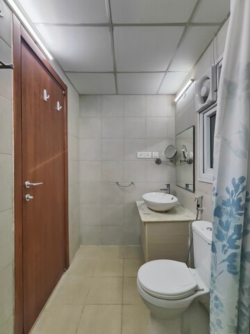 Bathroom in 2 BHK Apartment at Bhartiya Nikoo Homes, Thanisandra Main Road – for Sale