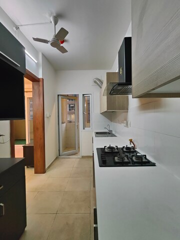 Kitchen in 2 BHK Apartment at Bhartiya Nikoo Homes, Thanisandra Main Road – for Sale