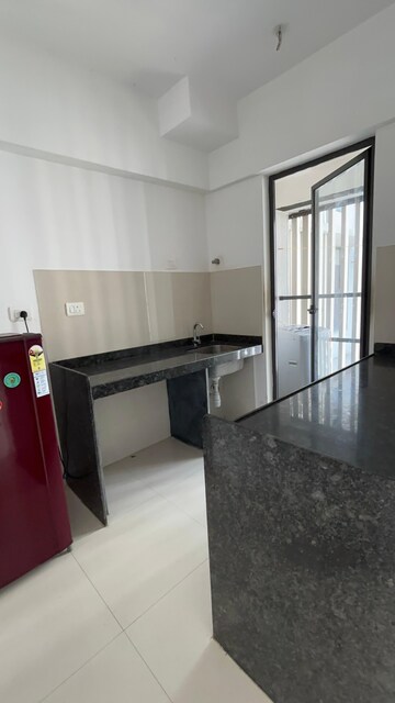 Kitchen in 1 BHK Apartment at Lodha Palava Downtown, Dombivli East – for Sale