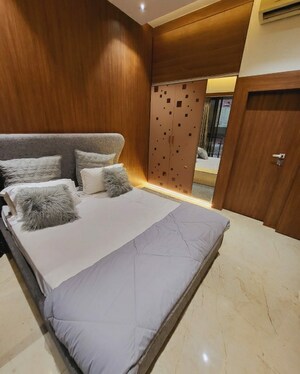 Bedroom in 2 BHK Apartment at Khushi Axis World, Themghar – for Sale