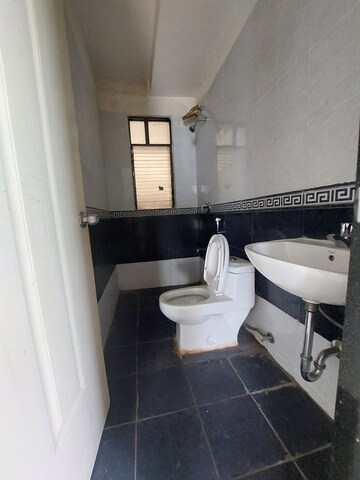 Bathroom in 2 BHK Apartment at Sarang Nanded City, Sinhagad – for Rent