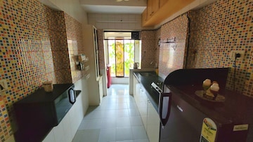 Kitchen in 3 BHK Apartment at Lotus Sky Garden, Malad West – for Rent