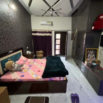 Master Bedroom in 1 RK Builder Floor at Raglan Gulmohar Trends, Dhakoli Village – for Rent