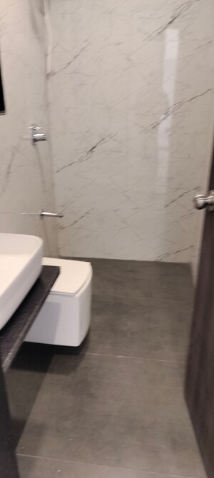 Bathroom in 2 BHK Apartment at Dev Leo Tower, Oshiwara – for Sale