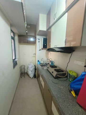 Kitchen in 1 BHK Apartment at Lodha Palava Crown, Dombivli East – for Rent
