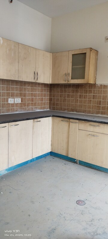 Kitchen in 3 BHK Apartment at Mahagun Mywoods, Sector 16c Greater Noida – for Rent