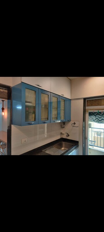 Kitchen in 2 BHK Apartment at Rustomjee Urbania, Majiwada – for Rent