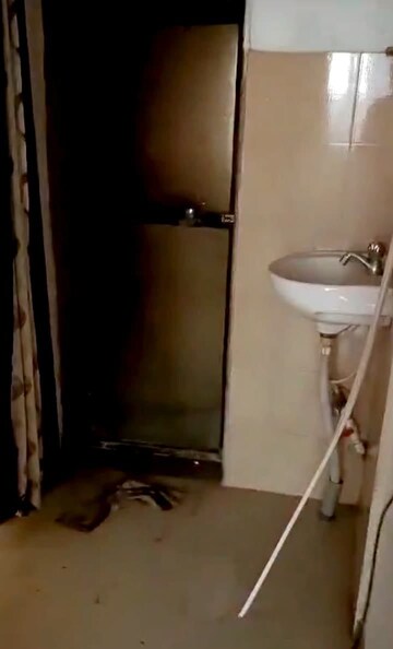 Bathroom in 1 BHK Apartment at Mangeshi City I, Kalyan West – for Sale