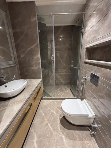 Bathroom in 4 BHK Builder Floor at Rajouri Garden – for Sale