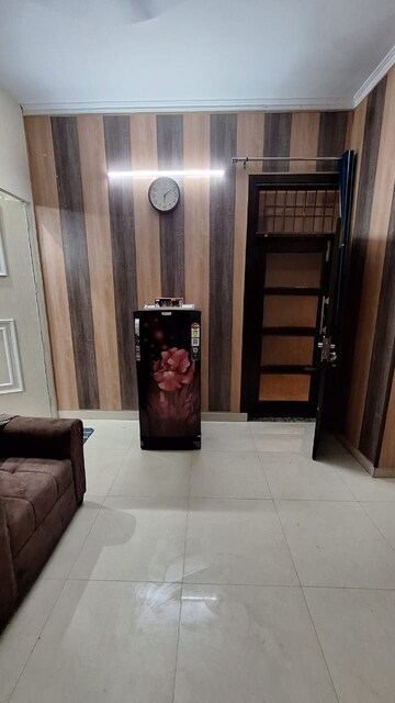 Living Room in 1.5 BHK Builder Floor at Guru Nanak Enclave, Dhakoli Village – for Rent