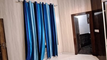 Bedroom in 1.5 BHK Builder Floor at Guru Nanak Enclave, Dhakoli Village – for Rent