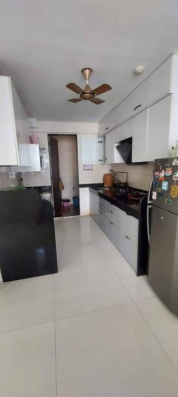 Kitchen in 2 BHK Apartment at Duville Riverdale Heights, Kharadi – for Rent