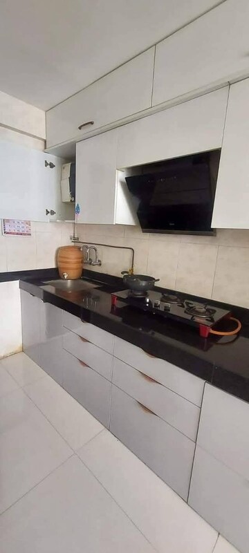 Kitchen in 2 BHK Apartment at Duville Riverdale Heights, Kharadi – for Rent