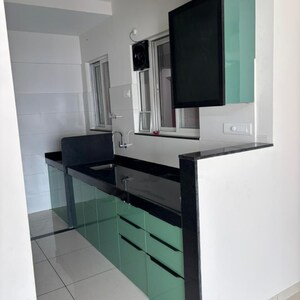 Kitchen in 2 BHK Apartment at VJ YashOne Infinitee, Mumbai Bangalore Highway – for Sale