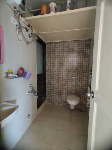 Bathroom in 1.5 BHK Apartment at Dosti Vihar, Samata Nagar – for Rent