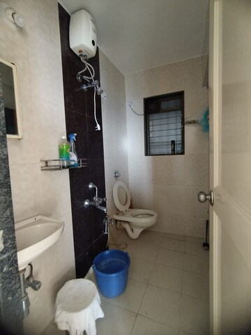 Bathroom in 1.5 BHK Apartment at Dosti Vihar, Samata Nagar – for Rent