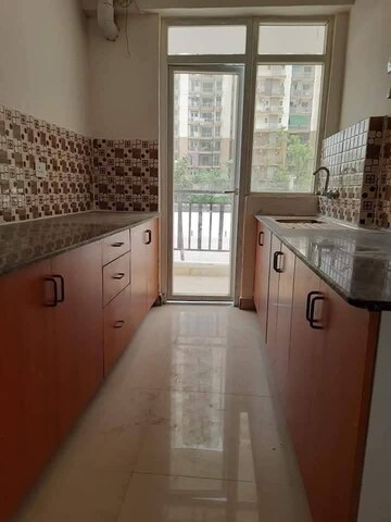 Kitchen in 3 BHK Apartment at Nimbus The Hyde park, Sector 78 – for Rent