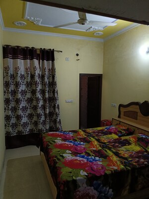 Bedroom in 6 BHK Independent House at Dhakoli Village – for Sale