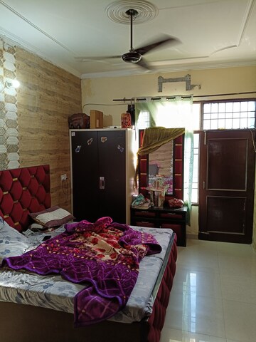 Bedroom in 2 BHK Builder Floor at Dhakoli Village – for Sale