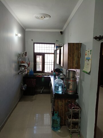 Kitchen in 2 BHK Builder Floor at Dhakoli Village – for Sale