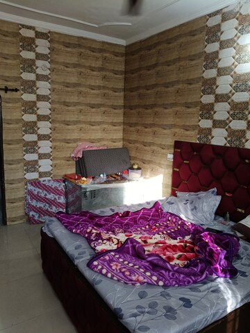 Bedroom in 2 BHK Builder Floor at Dhakoli Village – for Sale