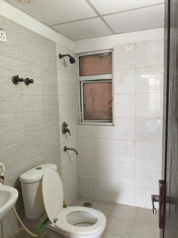 Bathroom in 2 BHK Apartment at Amrapali Silicon City, Sector 76 – for Rent